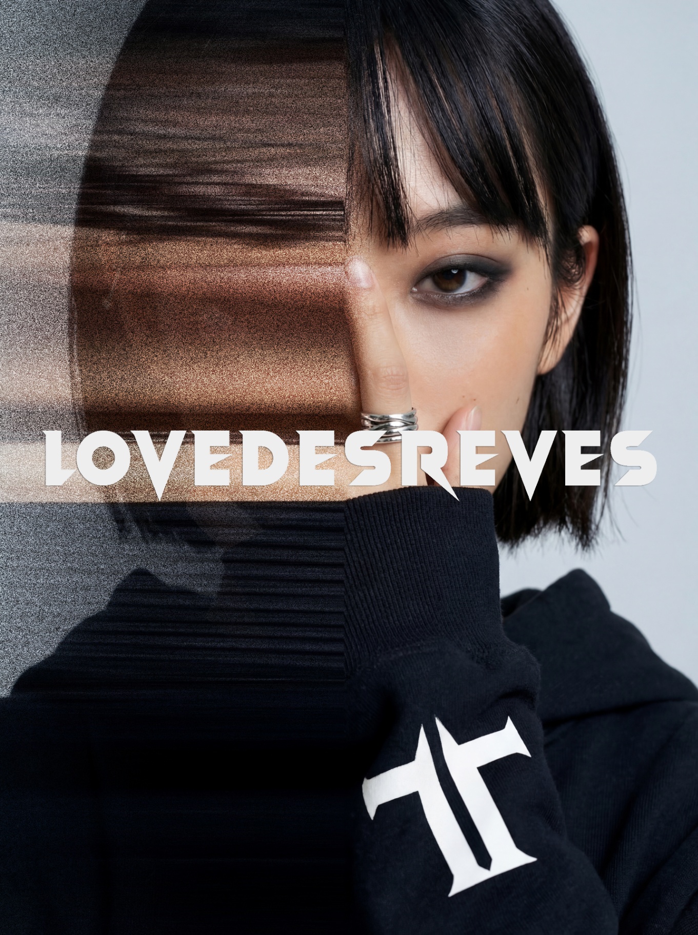Love Des Reves graphic portrait with motion blur and brand typography logo